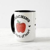 Mug L'enseignement est une oeuvre de l'art enseignant  (Devant gauche)
