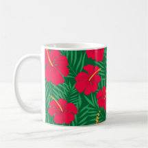 Les fleurs rouges d'Hibiscus sur les Feuilles trop