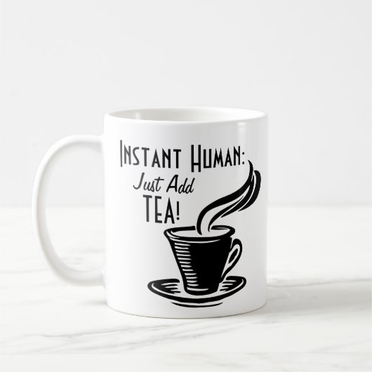 Mug L'humain instantané ajoutent juste le thé (Gauche)