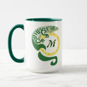 Mug Lizard, un alligator tribal, qui serre un monogram (Gauche)