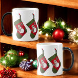 Mug Magique Snowman Plaid Scarf Hanging Christmas Stocking<br><div class="desc">Cette tasse de Noël en céramique amusante est ornée d'une photo d'un bas rouge et vert avec un bonhomme de neige adorable,  habillé d'un foulard et d'un ensemble casquette de saison. Commandez en 11 oz ou 15 az ou l'un des autres styles de buverie.</div>