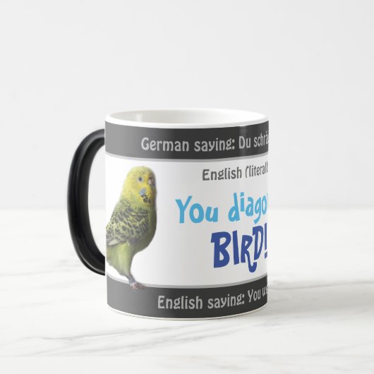 Mug Magique Vous oiseau diagonal - stupide traduit allemand! (Devant gauche)
