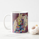 Mug Maiden (Vierge), Gustav Klimt, Art Nouveau Vintage<br><div class="desc">The Maiden (alias La Vierge) (1913) de Gustav Klimt est une peinture vintage de l'époque victorienne de beaux-arts symbolisant le portrait de portrait. Plusieurs femmes bâillonnent, s'étirent et dorment dans un lit recouvert de couvertures motifs en mosaïque colorée. À propos de l'artiste : Gustav Klimt (1862-1918) était un peintre symboliste...</div>