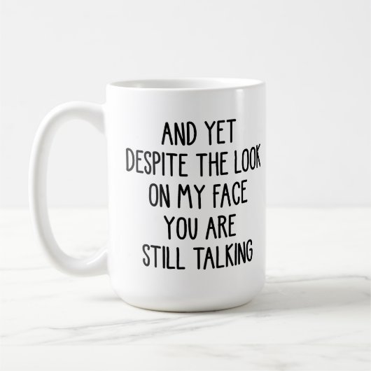 Mug Malgré l'expression sur mon visage tu continues à (Gauche)