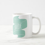 Mug Mariée Muggy<br><div class="desc">Grand comme cadeau pour la mariée... de siroter un café chaud et délicieux le matin mariage... "Mmmm, café" va-t-elle penser. "Un pas de plus pour épouser l'homme de mes rêves, hazaaaa !"</div>