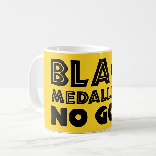 MUG MÉDALLIONS NOIRES PAS D'OR (Devant gauche)