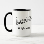 Mug Mi fajfas pri tio. (Gauche)