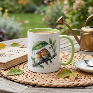 Mug Mignons rouges-gorges sous un parapluie de feuille