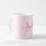 Mug Monogramme de nom à rayures roses modernes<br><div class="desc">Commencez votre matinée avec style avec cette tasse à café rose rayée personnalisée, conçue pour apporter un charme intemporel à chaque gorgée. Avec un fond rayé rose pâle et blanc, cette tasse élégante est personnalisée avec votre initiale de monogramme et votre nom complet dans une police de caractères cursive élégante,...</div>
