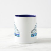 Mug Montez sur un rocher. (Centre)
