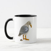 Mug mouette jette un oeil sur sa fiente. (Gauche)