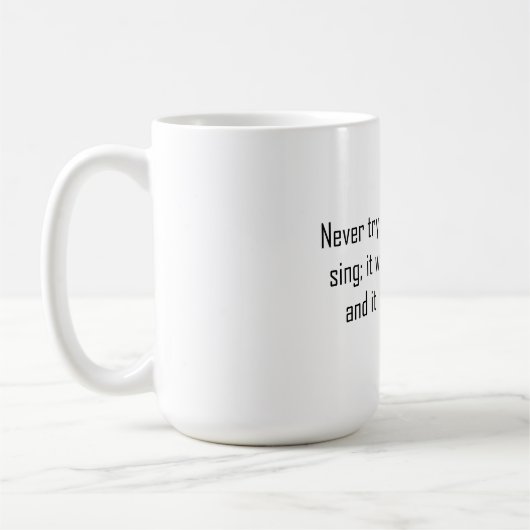 Mug N'essayez jamais d'enseigner à un cochon de chante (Gauche)