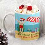 Mug Noël en juillet Été Santa Claus Beach House<br><div class="desc">Cette jolie tasse de Noël en juillet fait un cadeau parfait pour une fête d'été pour un bain de plage ou de piscine. Faites-en une extravagance amusante sur le thème du pôle nord avec le Père Noël dans ses maillots de bain à côté d'un parapluie de plage rayé rouge et...</div>