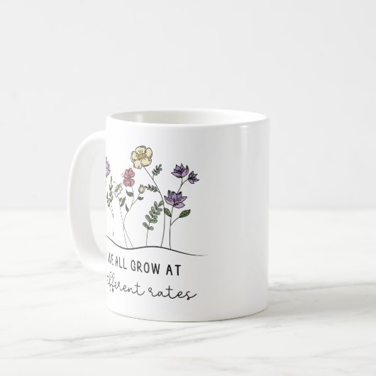 Mug Nous Augmentons À Différents Taux Plante (Devant gauche)