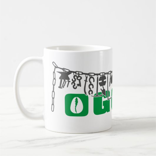 Mug Oggun Achaba (Gauche)