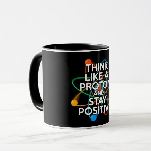 MUG PENSEZ À UN PROTON ET RESTEZ POSITIF (Devant gauche)