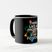 MUG PENSEZ COMME UN PROTON ET RESTEZ POSITIF (Devant gauche)