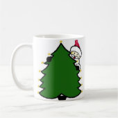 Mug père Noël se cache derrière l'arbre de Noël (Gauche)