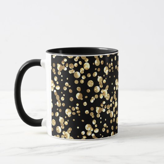 Mug Pois or sur un arrière - plan noir. (Gauche)