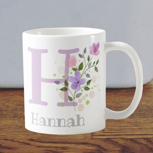 Mug Première initiale plus le nom Hannah avec des fleu