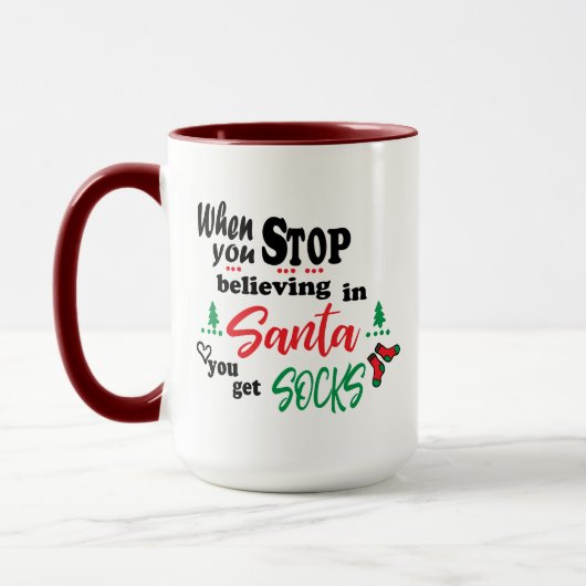 Mug Quand vous arrêtez de croire au Père Noël vous obt (Gauche)