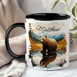 Mug Réflexion Brown du lac Grizzly Bear<br><div class="desc">Profitez de votre boisson préférée avec la bouge de réflexion Grizzly Bear Lake Mountain Brown. Cette tasse unique présente un design époustouflant d'un ours grizzli au bord d'un lac de montagne serein, avec le paysage majestueux magnifiquement reflété dans l'eau. Customisé avec votre nom, il ajoute une touche spéciale qui le...</div>