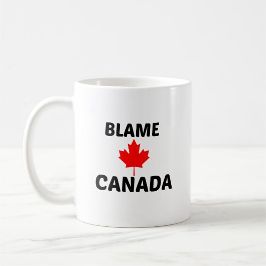 MUG REPROCHER LE CANADA (Gauche)