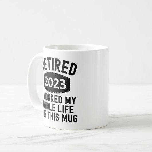 Mug Retraité 2023 j'ai travaillé toute ma vie pour cet (Devant gauche)
