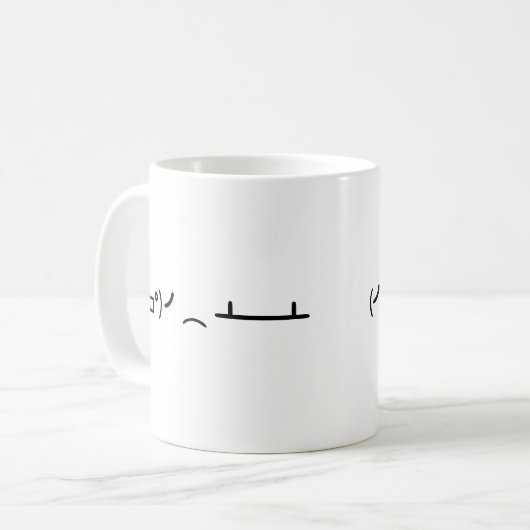 Mug Secousse de Tableau renversant l'émoticône d'ASCII (Devant gauche)