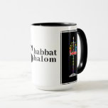 Mug Shabbat Shalom Menorah<br><div class="desc">6 flammes de cette joyeuse menorah représentant les jours de la création pointent vers la flamme centrale, qui représente le 7ème jour de la création quand G-d a vu que tout ce qu'il avait fait était très bon : et Il se reposa. C'est représentatif de notre Sabbat... Shabbat... le 7e...</div>