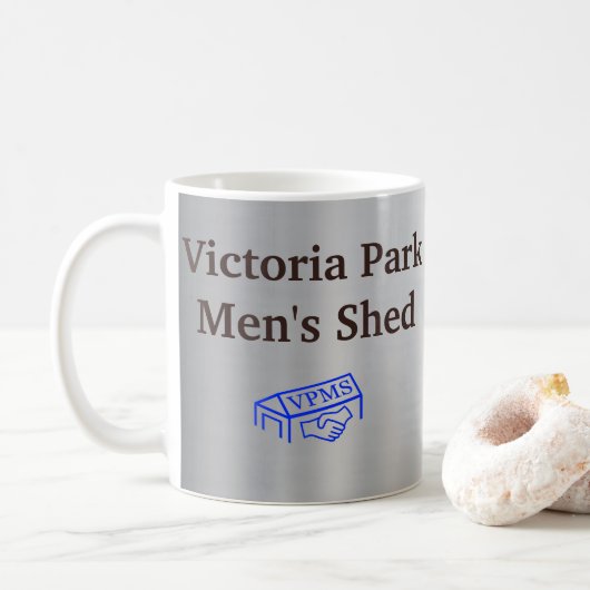 Mug Shed Mug masculin de Victoria Park (Avec donut)