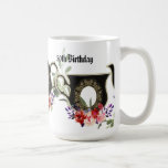 Mug Thé Floral Noir Afternoon Tea 50th Birthday Co<br><div class="desc">Faites-le avec style - une fête de thé haute lorsque quelqu'un que vous aimez veut célébrer le 50e anniversaire jalon. L'illustration présente une théière noire entourée d'une flore rouge et d'un feuillage vert. Parfait pour un cadeau à un ami, une famille et des collègues. Ajoutez un peu de zeste à...</div>