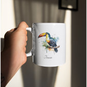 Mug toucan coloré assis sur une branche