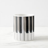 Mug touches piano (Centre)