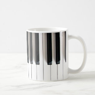 Mug touches piano