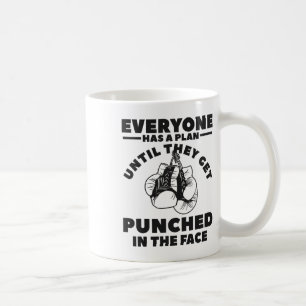 Mug Tout le monde a un plan jusqu'à ce qu'ils reçoiven