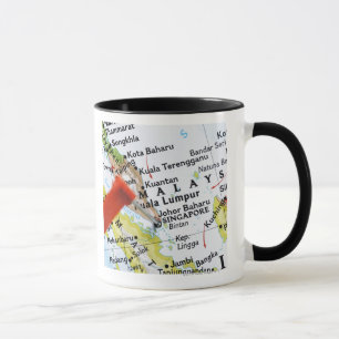 Mug Tracez la goupille placée à Singapour sur la