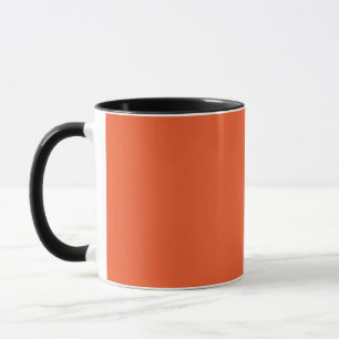 Mug un arrière - plan orange avec une bordure noire