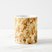 Mug Un bon popcorn sur tout l'arrière - plan. Nourritu (Centre)