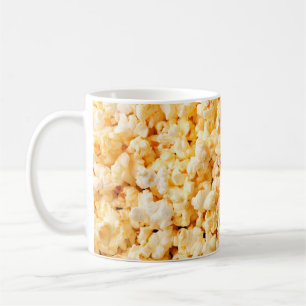 Mug Un bon popcorn sur tout l'arrière - plan. Nourritu