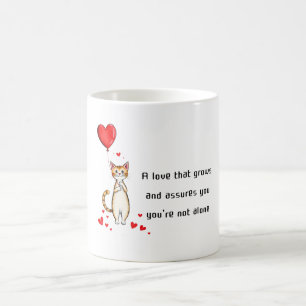 Mug Un chat tenant un ballon en forme de cœur