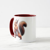 Mug Un écureuil roux serre contre lui une noisette. (Devant gauche)