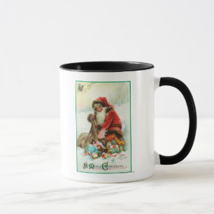 Mug Un Joyeux Noël Père Noël emballant des jouets dans