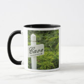 Mug Un panneau indiquant la cave à vin (Cave) dans (Gauche)