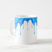Mug Une crème bleue coule le long d'un mug. (Devant gauche)