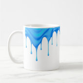 Mug Une crème bleue coule le long d'un mug. (Gauche)