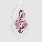 Musical treble clef notes with sakura flowers (devant)