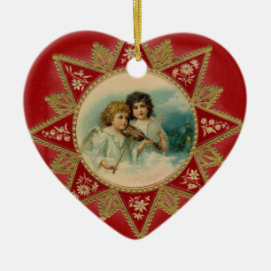 MUZIEKENGELEN IN ROOD HART KERAMISCH ORNAMENT
