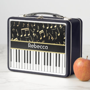 Muzieknoten en pianoketoetsen, zwart en goud