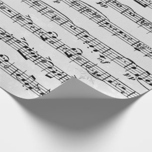 Muzieksamenstelling op zilversneeuwvlokken cadeaupapier
